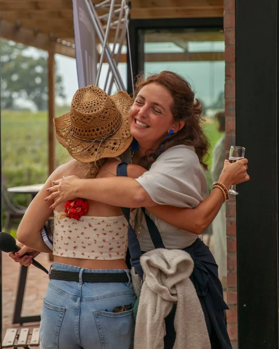 Two members hugging at the Gwen Event in George, February 2026